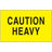 Fluorescent yellow caution heavy label with black text, rectangular