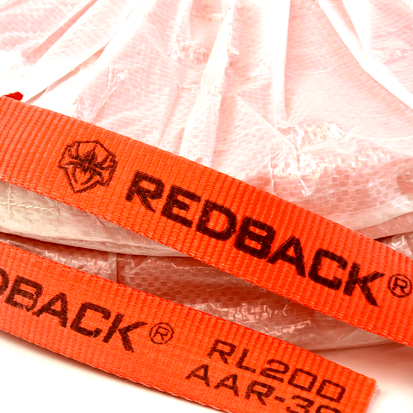 Orange woven lashing strap with printed branding and size markings