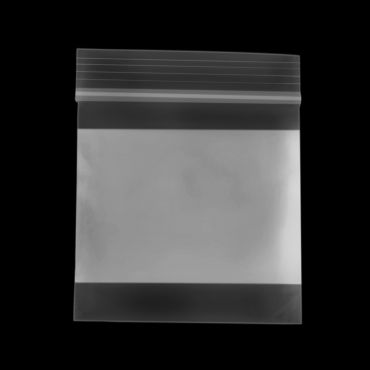 White reclosable poly bag with block bottom and heat-seal style closure