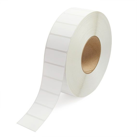 White label roll with exposed strip of rectangular thermal transfer labels, 3-inch core