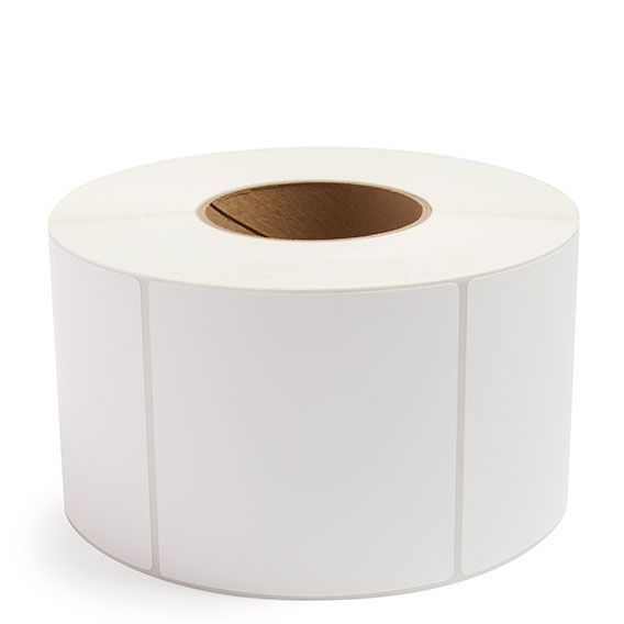 White thermal transfer label roll with blank rectangular labels on a 3-inch core