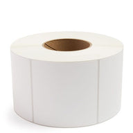 White thermal transfer label roll with blank rectangular labels on a 3-inch core